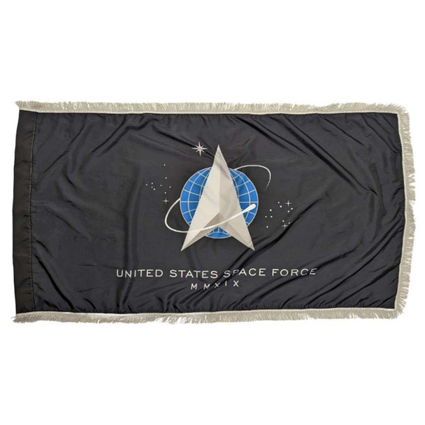 The indoor Space Force flag has a black field surrounded on 3 sides by silver fringe. In the center is the Space Force’s emblem.