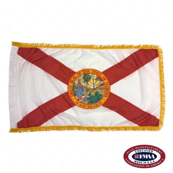 The indoor Florida flag has 3 borders of gold fringe around the white field. There is a red saltire across the flag with a seal in the center. FMAA Certified Made in America seal.