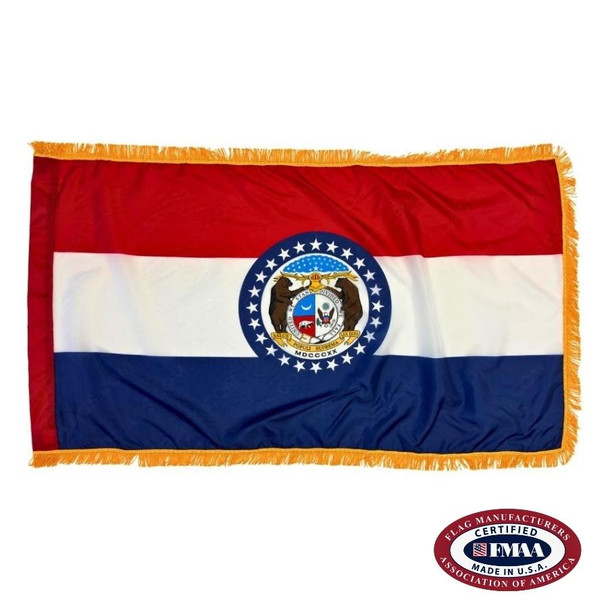 The indoor Missouri flag has 3 sides of gold fringe around the 3 horizontal red, white, and blue stripes. In the center is the state seal. FMAA Certified Made in America seal.