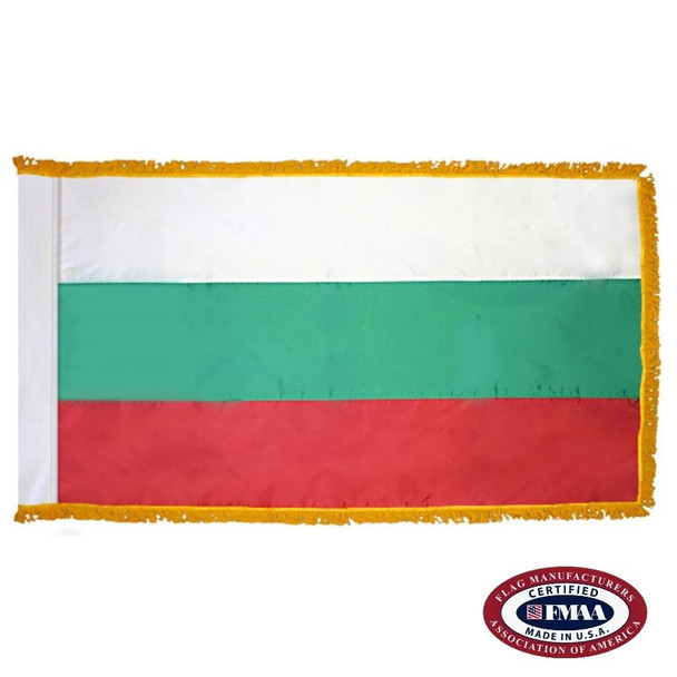 The indoor Bulgaria flag has 3 sides of gold fringe around the white, green, and red tricolor design. FMAA Certified Made in America seal.
