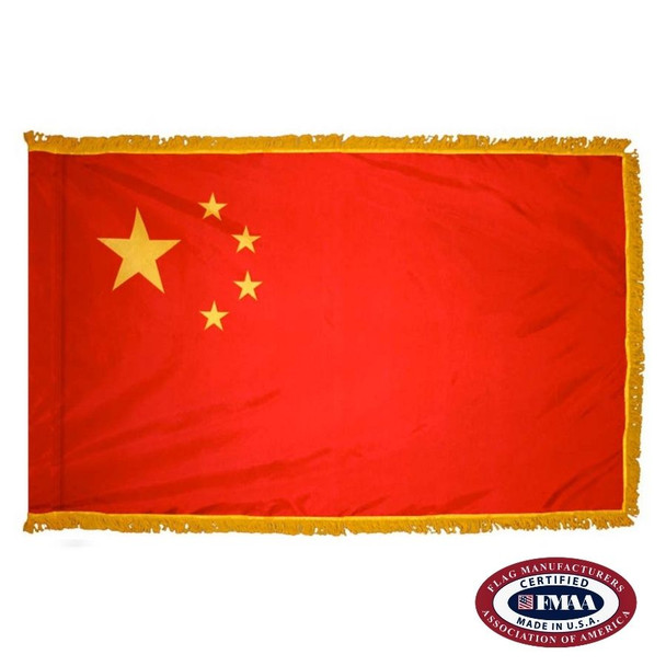 The indoor China flag has 3 sides of gold fringe around a red field with one big and four smaller gold stars in the canton. FMAA Certified Made in America seal.