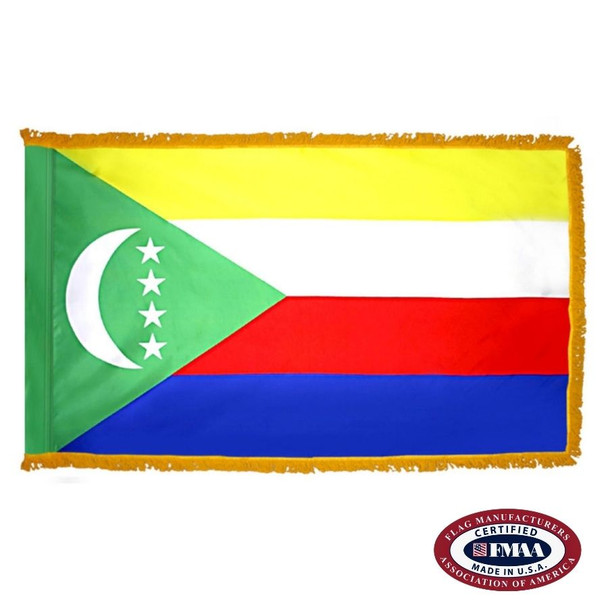 The indoor Comoros flag has 3 sides of gold fringe around 4 horizontal yellow, white, red & blue stripes. A green triangle is on the hoist side. FMAA Certified Made in America seal.