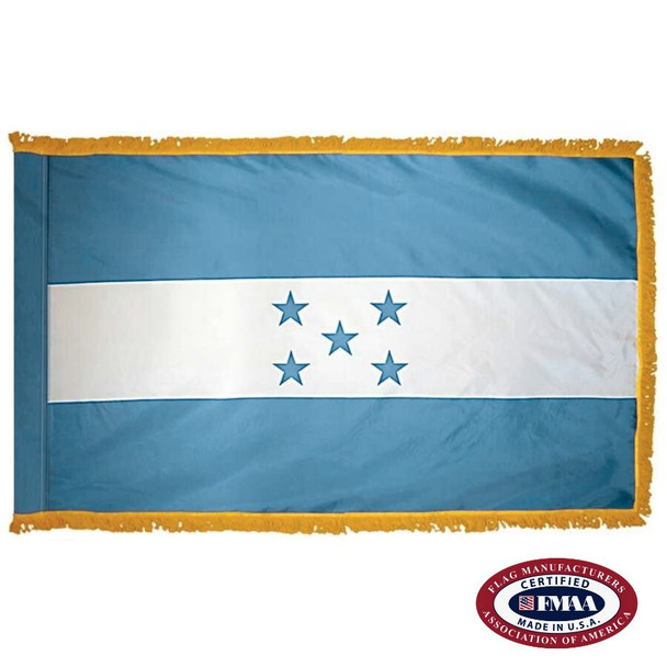 The indoor Honduras flag has 3 sides of gold fringe around a blue and white triband. In the center of the white stripe are five blue stars. FMAA Certified Made in America seal.
