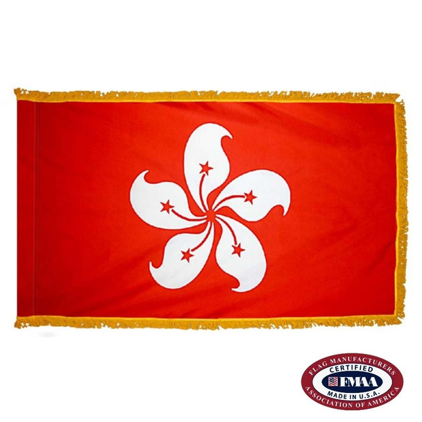 The indoor Hong Kong flag has 3 sides of gold fringe around a red field with a white flower with 5 petals in the center. FMAA Certified Made in America seal.