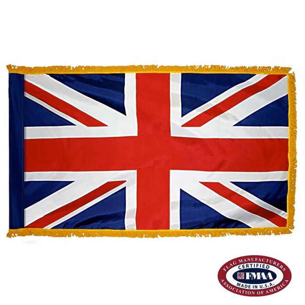 The indoor UK flag has 3 sides of gold fringe around a blue field with red perpendicular and diagonal crosses outlined in white. FMAA Certified Made in America seal.