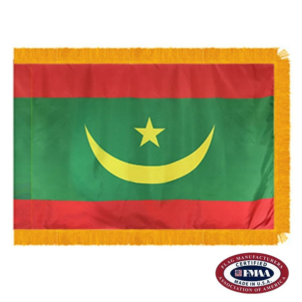 The indoor Mauritania flag has 3 sides of fringe around a green field with a crescent & star in the center. At the top & bottom are red bands. FMAA Certified Made in America seal.