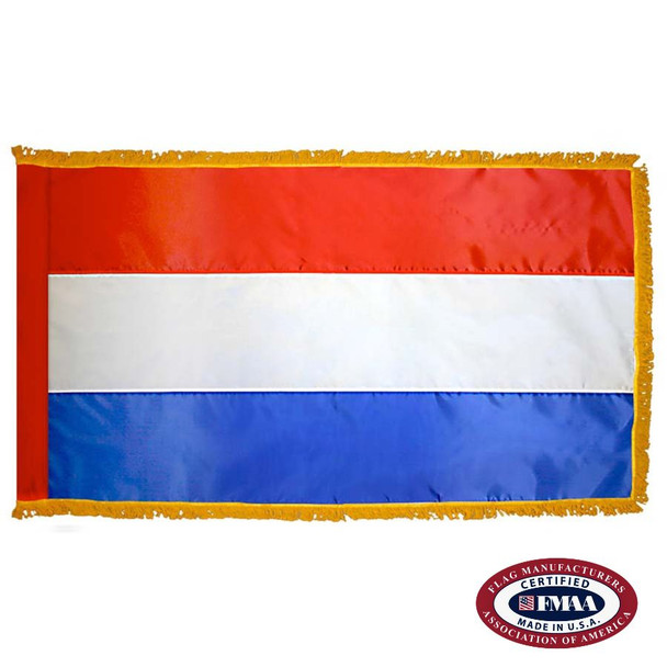 The indoor Netherlands flag has 3 sides of gold fringe around a horizontal red, white, and blue tricolor. FMAA Certified Made in America seal.