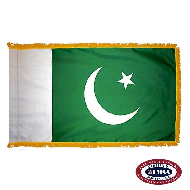 The indoor Pakistan flag has 3 sides of gold fringe around a green field with a white field on the left and a crescent & star on the right. FMAA Certified Made in America seal.