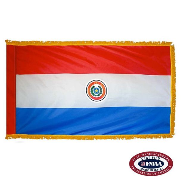 The indoor Paraguay flag has 3 sides of gold fringe around a horizontal red, white, and blue tricolor. In the center is a coat of arms. FMAA Certified Made in America seal.