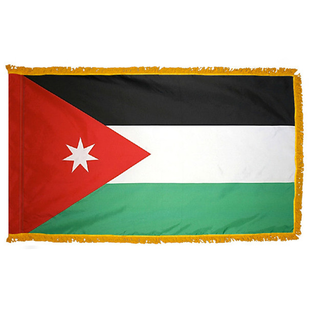 The indoor Jordan flag has 3 sides of gold fringe around a black, white, and green tricolor. On the left is a red triangle and a white star.