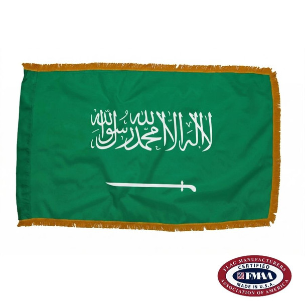 The indoor Saudi Arabia flag has 3 sides of gold fringe around a green field with the Shahada and a sword in white in the center. FMAA Certified Made in America seal.