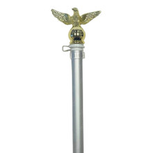 The upper half of a 6’ tangle-free flagpole with an eagle ornament at the top.