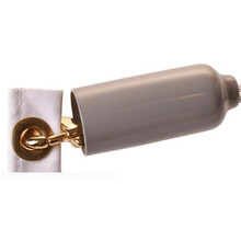 A flag clip is attached to the grommet in the corner of a flag, with a gray covering protecting the snap.