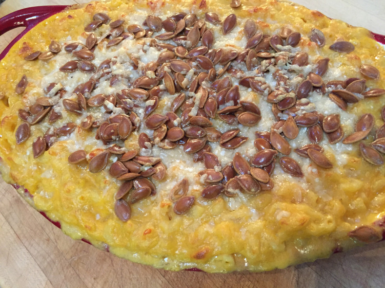 Macaroni and Cheese with Pumpkin Sous Vide Topped with Parmesan and Roasted Pumpkin Seeds