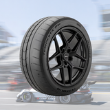 Vitour Tempesta P1 P-01R performance tire mounted on a track car during high-speed cornering.