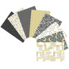 A collection of 8 Canary Yellow fat quarters from Andover Fabrics' Rancho Relaxo collection, featuring soft pastels and neutral tones in yellows and greys, inspired by mid-century design and vintage textiles, displayed in a neatly arranged stack.