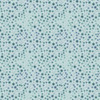 A detailed close-up of the Grassy Fields Daisy Dots fabric from the At Days End Collection, featuring tiny daisies and dotted berries in shades of mint green, teal, and blue on a light green background.