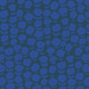 Close up Puffy Daisy Ink quilting cotton fabric by Heather Ross for Windham Fabrics, featuring bold cobalt daisy motifs on a dark navy blue background.