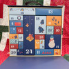 Open Quilter’s Advent Calendar showing 24 numbered drawers