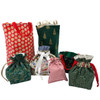 Collection of handmade reusable fabric gift bags in festive prints, including drawstring and handled styles, in red, green, and patterned Christmas fabrics. Collection of handmade reusable fabric gift bags in festive prints, including drawstring and handled styles, in red, green, and patterned Christmas fabrics.