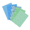 Sea Glass Meadow fat quarter bundle featuring blue and green quilting cottons with floral and dot prints fanned out