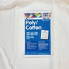 A close-up image of Matilda's Own 80/20 Cotton Poly Quilt Wadding with its blue product label displayed on top. The label highlights its composition of 80% cotton and 20% polyester, and includes icons noting features such as "Machine Washable," "Medium Loft," and "Made in Australia." The wadding width is marked as 2.4 metres. Additional details include a stitch distance of up to 10 inches, a shrinkage rate of 2.5%, and a note on its suitability for people with allergies. The bottom of the label features the Victorian Textiles logo and care instructions. The wadding beneath appears soft and off-white in colour.
