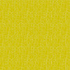 Chartreuse yellow cotton fabric with intricate white alphabet design from the Soliloquy collection designed by Alison Glass for Andover Fabrics.