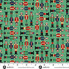 Makower UK The Nutcracker Collection Soldiers Green fabric with red, green and navy Nutcracker soldiers on green, shown with a ruler for scale.