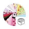 Little Ladies 2.5 inch strip roll by Tami Jones for Andover Fabrics showing 40 manufacturer-cut quilting strips in pink, lilac, yellow, green, blue, white and black.