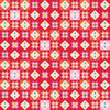 Thread & Ink Designs Home For Christmas Festive Tiles fabric in red, coral, pink and cream with geometric quilt blocks, hearts, stars and diamonds