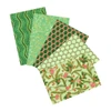 Wintergreen five-piece fat quarter bundle from Robert Kaufman Peppermint Twist with green, mint and cream prints, peppermint motifs, holly and metallic gold details
