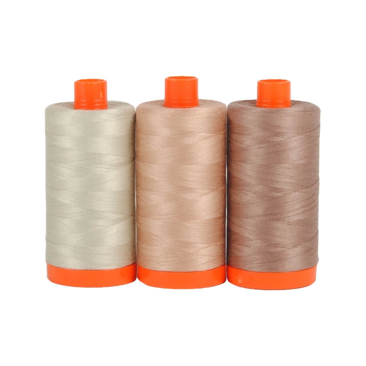 Three spools of Aurifil Verona 50wt Egyptian cotton thread in coordinating shades of beige on a white background.