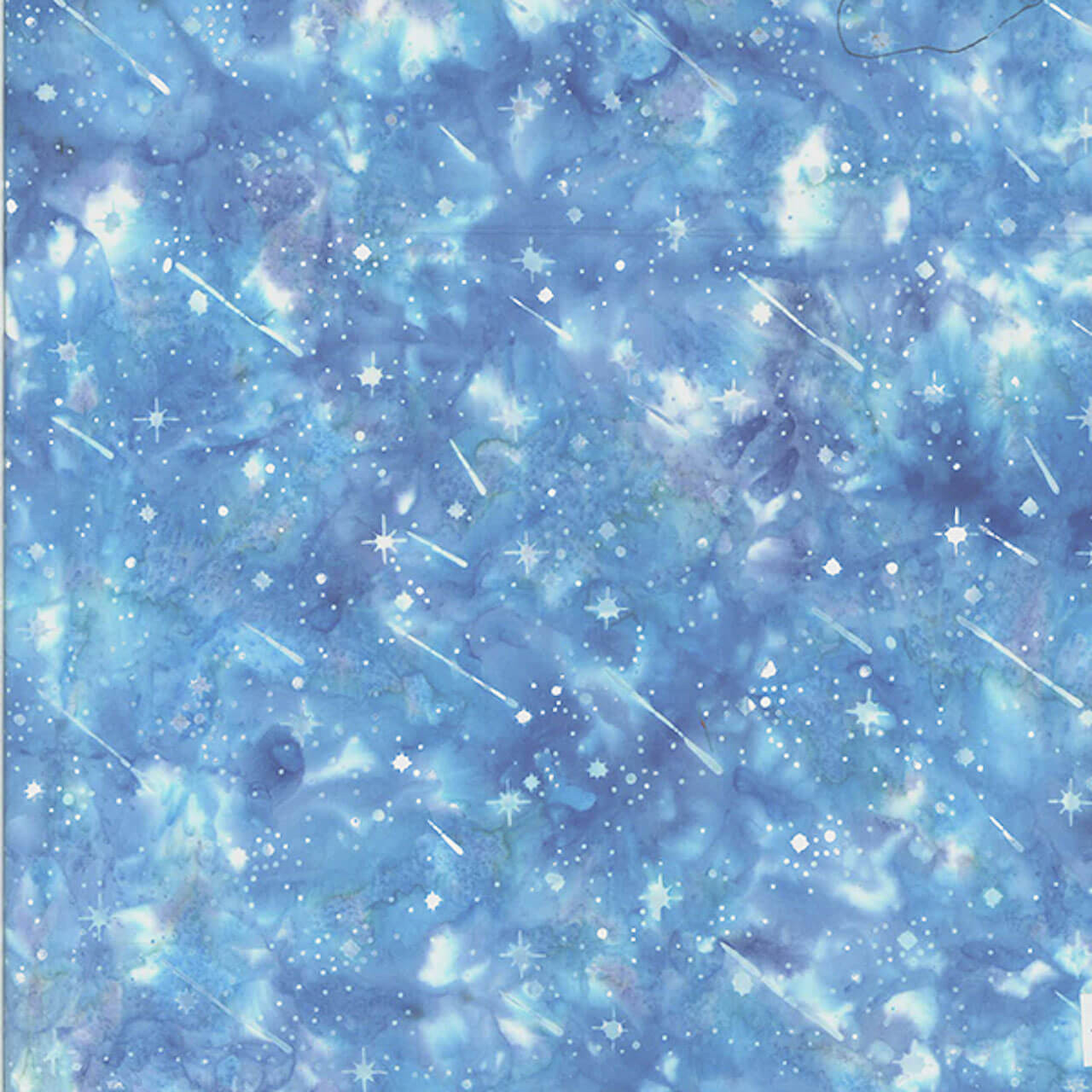 Blue 100% cotton batik fabric from Hoffman Fabrics' Bali Handpaints Batiks series named Twilight Tinsel, featuring a starry, tinsel-like pattern.