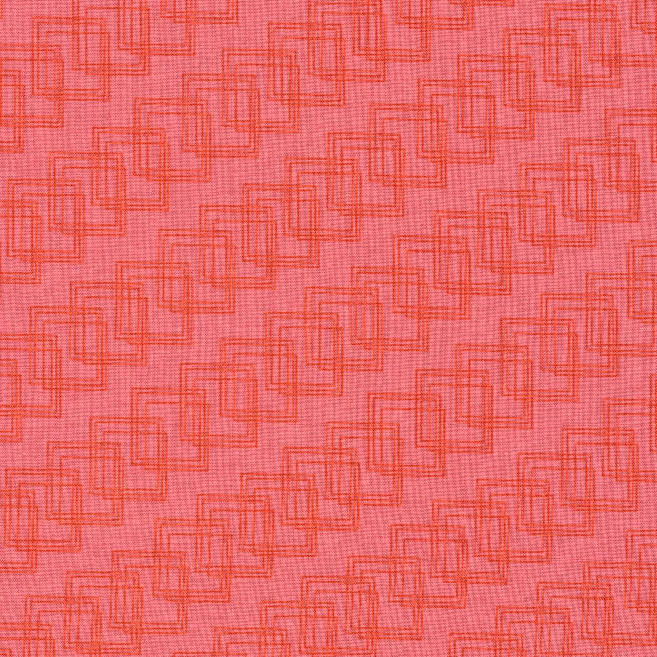 Close-up of Cloud9 Fabrics' Geo Cubes quilting fabric in orange, featuring geometric patterns.