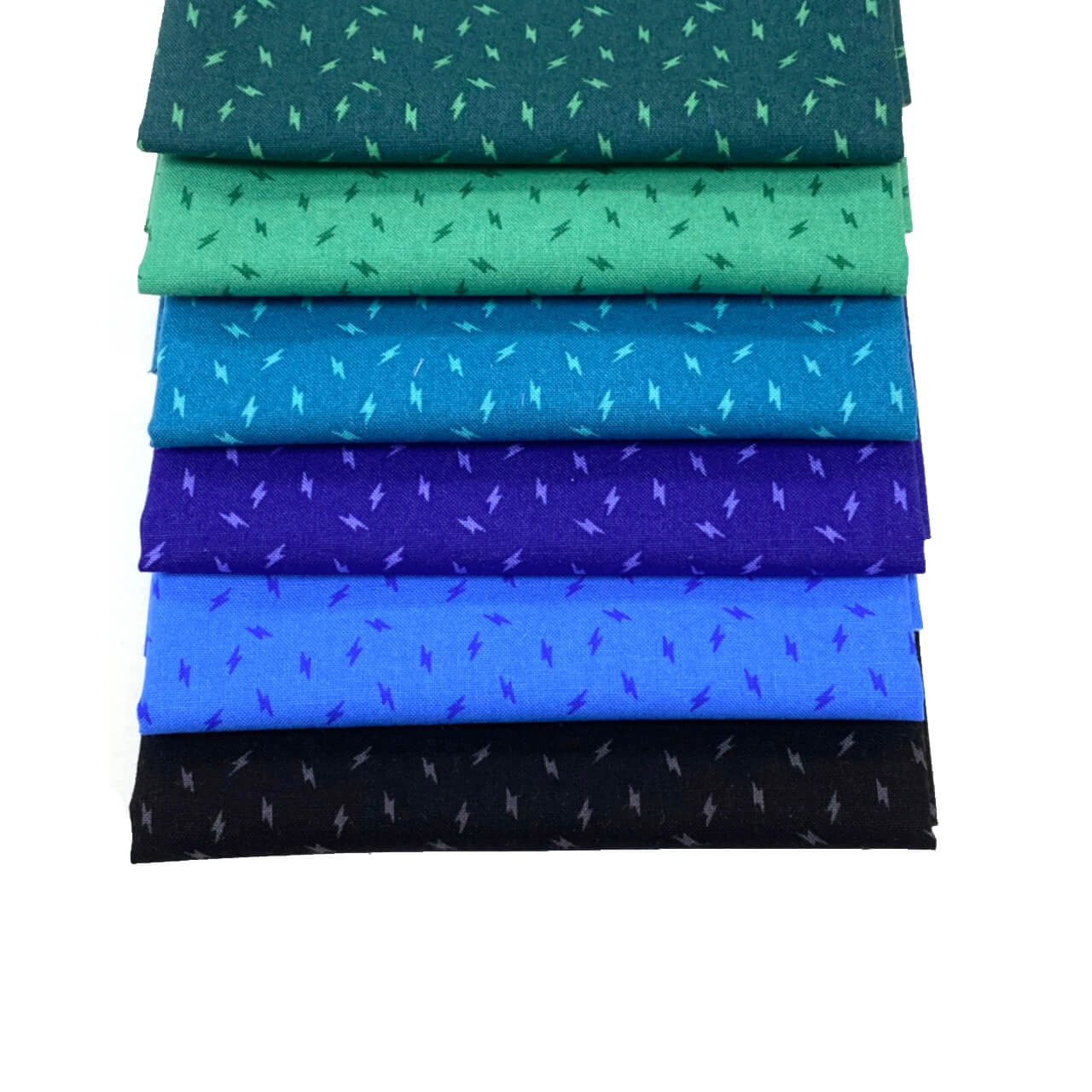 The image shows the 6 blue and teal cascading fabric squares with tiny lightening bolt patterns. A great blender fat quarter pack fromt he Atomic collection.