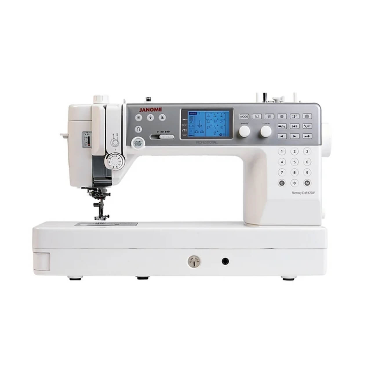 A Janome Memory Craft 6700P sewing machine is shown from a front angle. The machine is primarily white with a gray control panel area. It features a digital display screen, various buttons, and knobs for controlling different sewing functions. The left side has a large spool holder, while the sewing needle and presser foot are visible below the arm. A large flat base provides stability for the fabric while sewing. The overall design is modern and professional, indicating a high-end, computerized sewing machine model suitable for advanced sewing tasks.