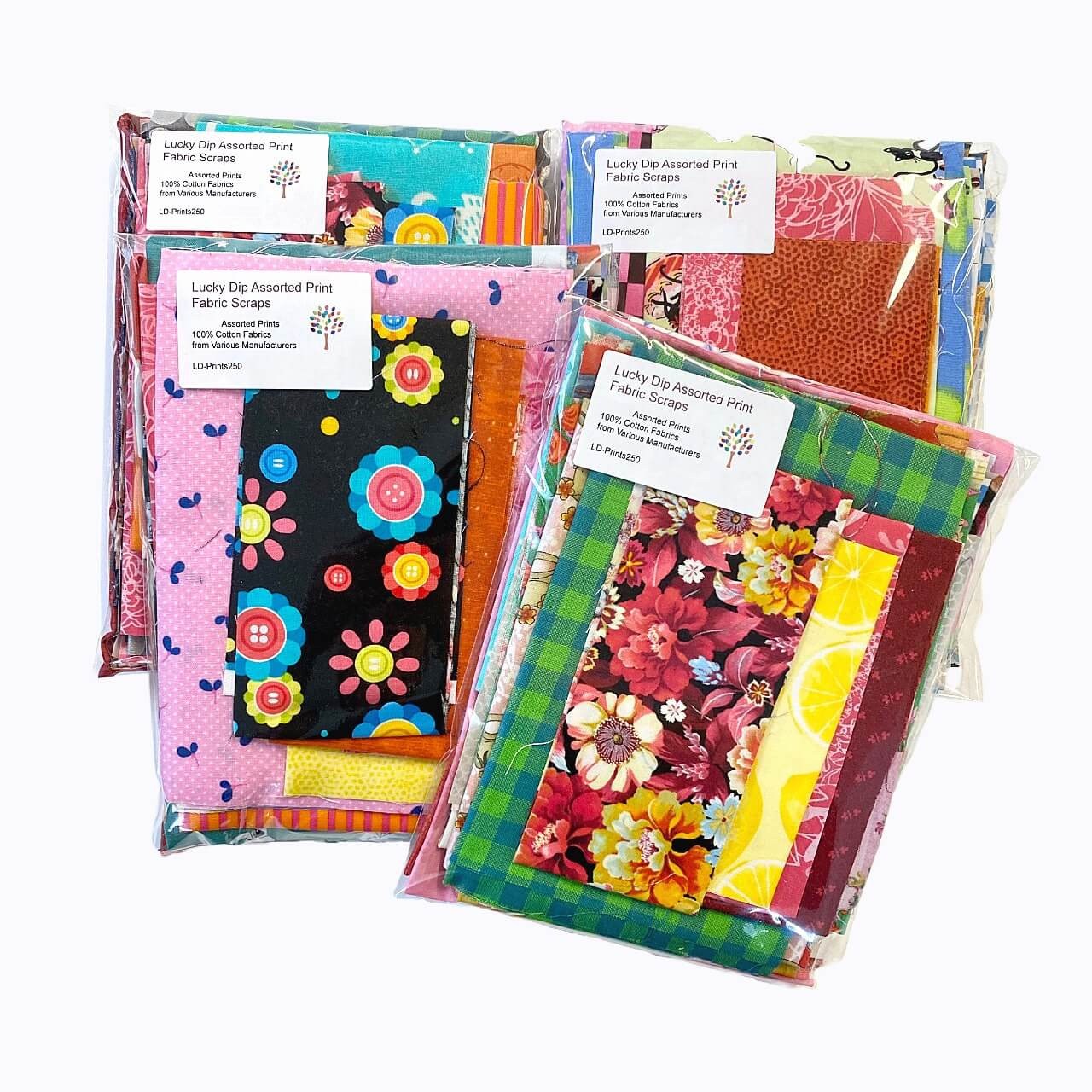 200g pack of high-quality fabric remnants / scraps in various colours and prints in clear compostable packaging