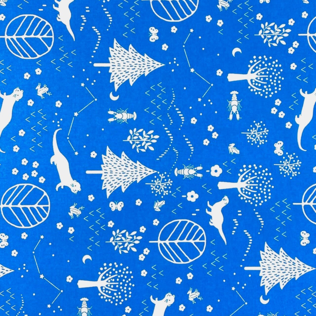 Blue 100% cotton fabric from Paintbrush Studios 'Otter Romp' collection featuring playful otters and celestial motifs.