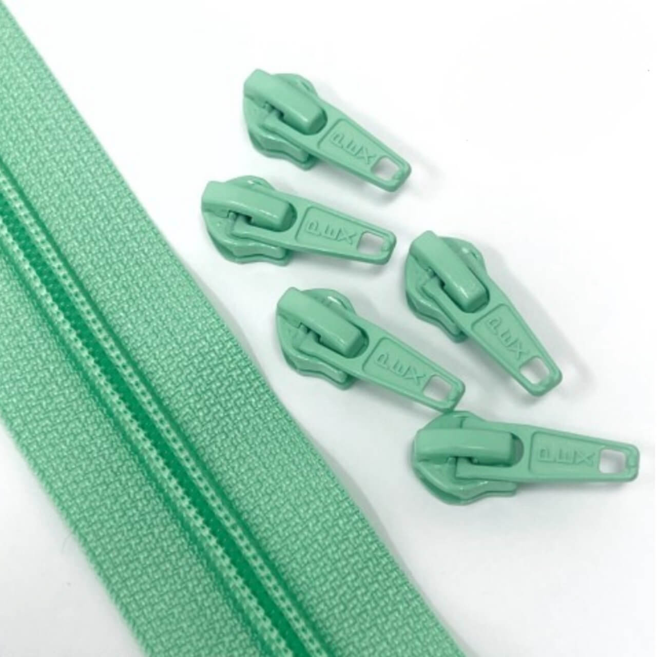 No.5 continuous coil zip in mint with matching pulls