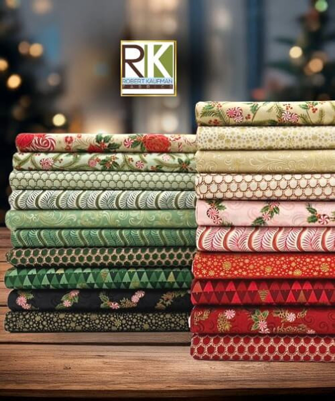 Robert Kaufman Peppermint Twist fabric stack; metallic Christmas prints in red, green, cream and black featuring holly, candy canes, poinsettias, stripes, snowflakes and geo trees.