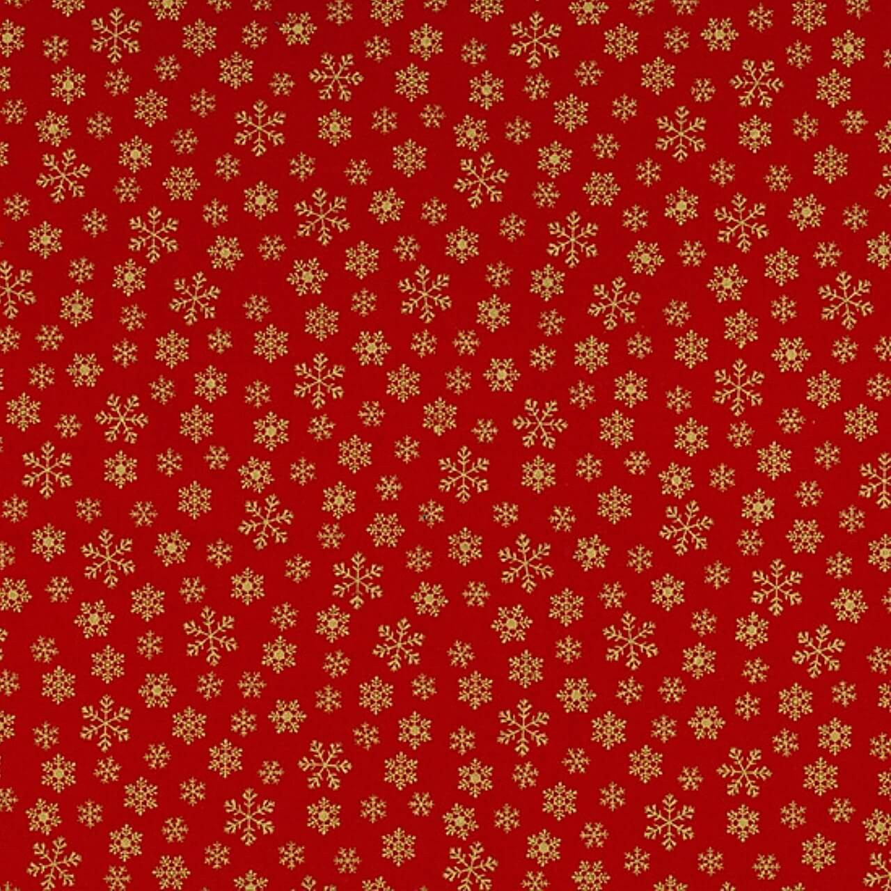 Red cotton fabric with full-size gold metallic snowflakes by John Louden.