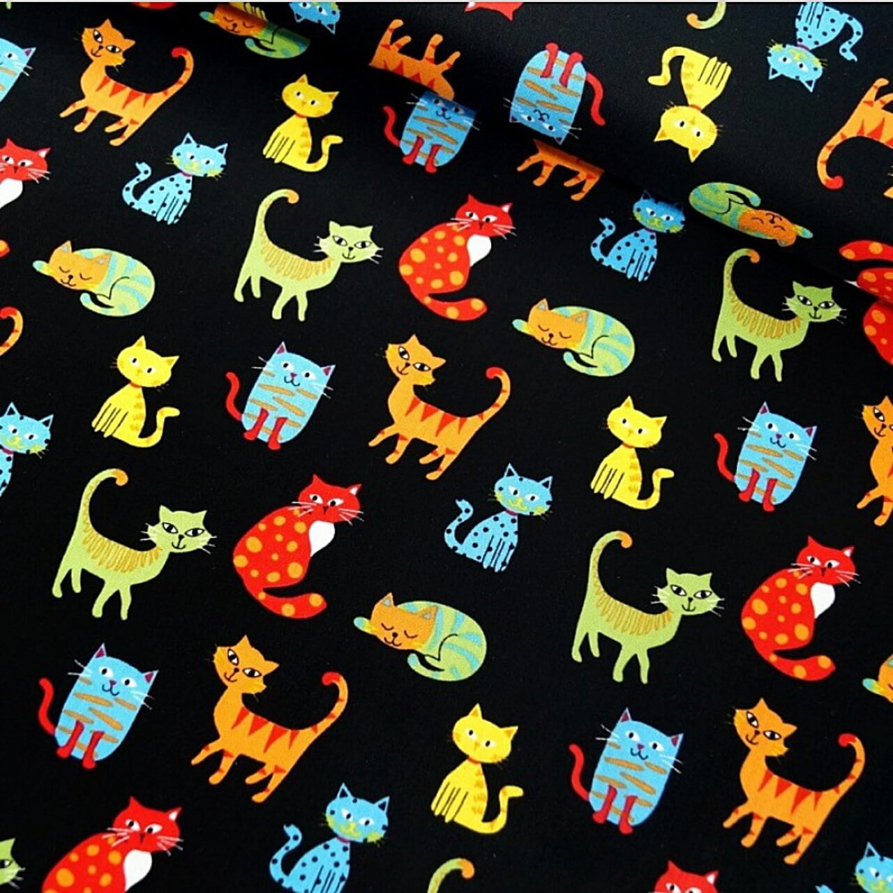 Nutex Happy Paws collection fabric Happy Paws - Cats with colourful illustrated cat motifs on a black cotton background