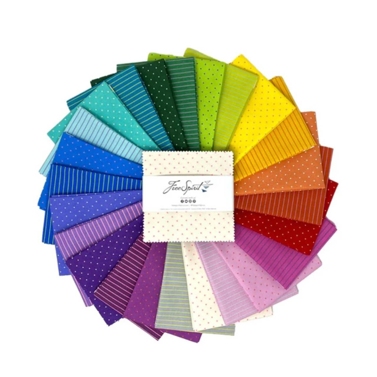 Free Spirit Tula Pink True Colors Tiny Coordinates 5 inch charm squares featuring colourful dot and stripe blender fabrics arranged in a rainbow colour wheel.