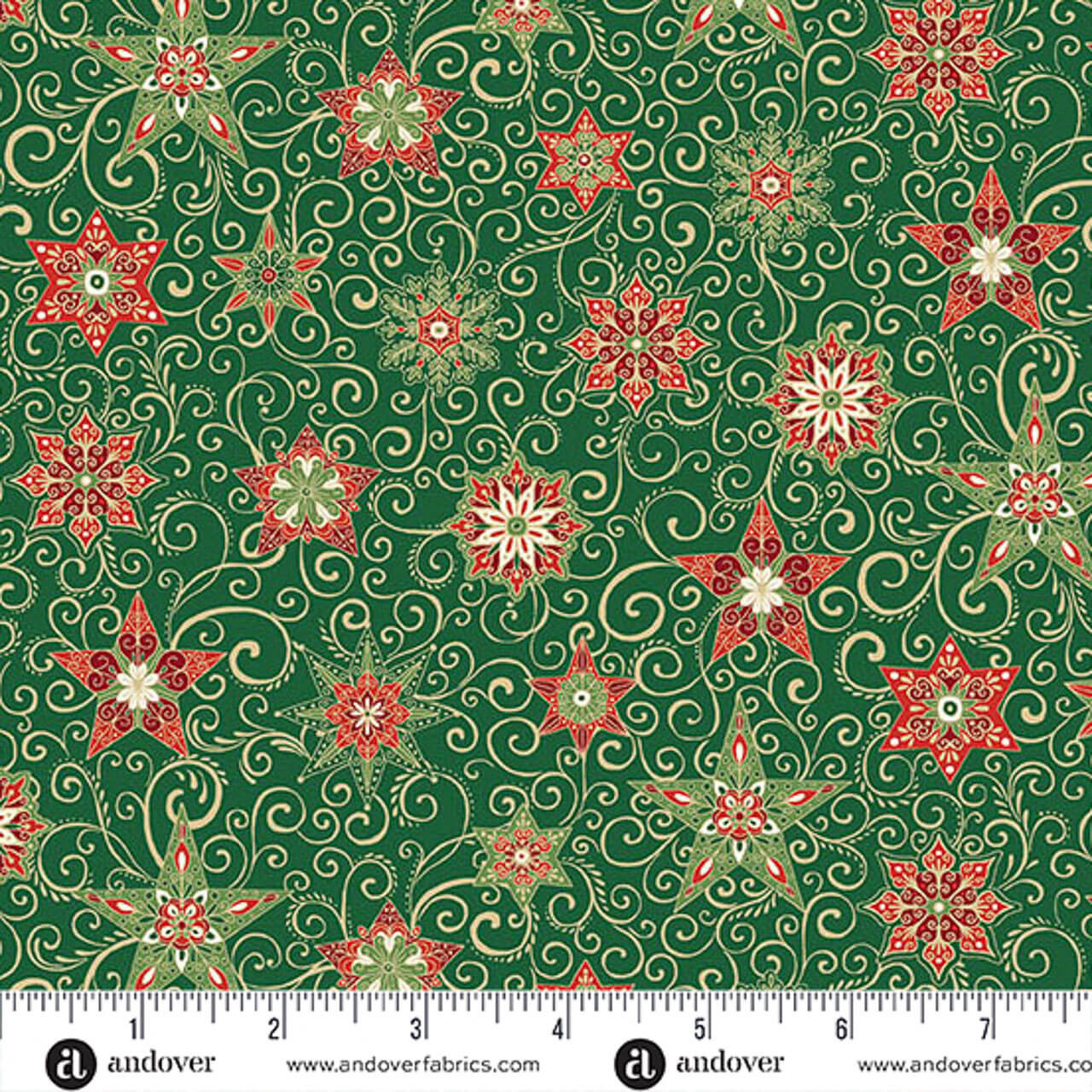 Makower UK Adorn Collection Star in Green metallic quilting fabric shown with ruler for scale, featuring evergreen background, decorative stars, gold scrollwork and metallic accents.