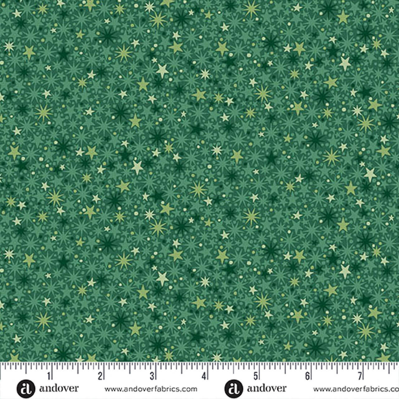 Makower UK The Nutcracker Collection Twinkle Green fabric with layered green stars and starbursts on green, shown with a ruler for scale.