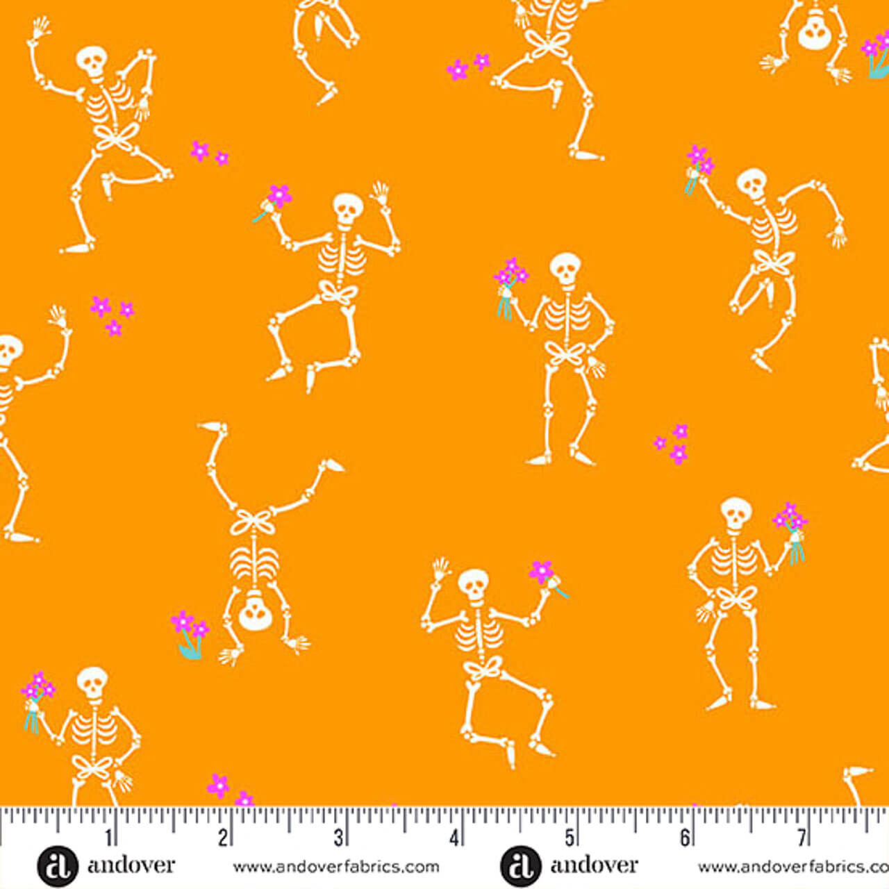 Andover Fabrics Ghostly Garden Skeleton Jig in Orange cotton fabric with white skeletons and pink flowers on pumpkin orange, shown with ruler for scale