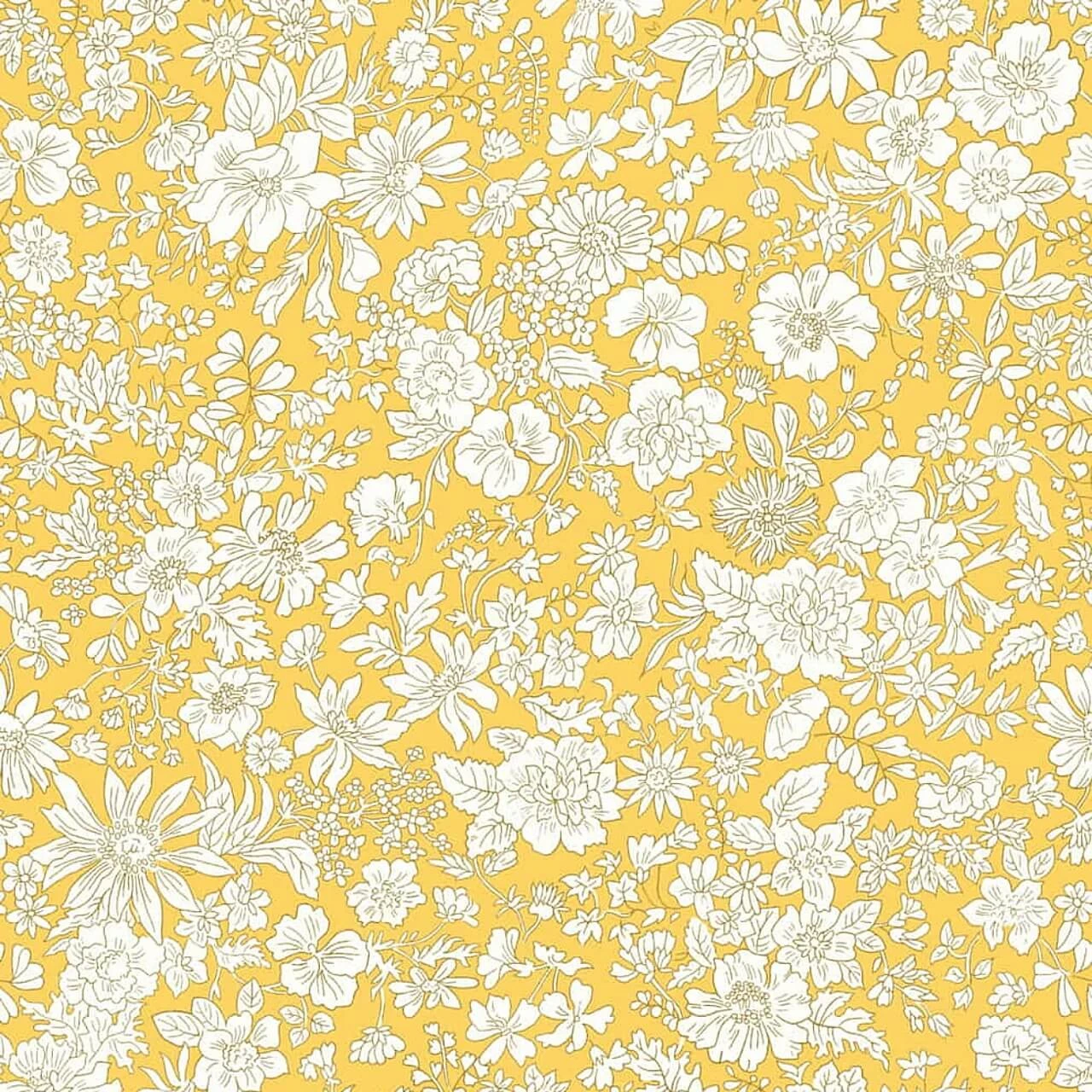 Emily Belle Sunshine Yellow fabric by Liberty Fabrics with detailed cream flowers and foliage on a bright sunshine-yellow background