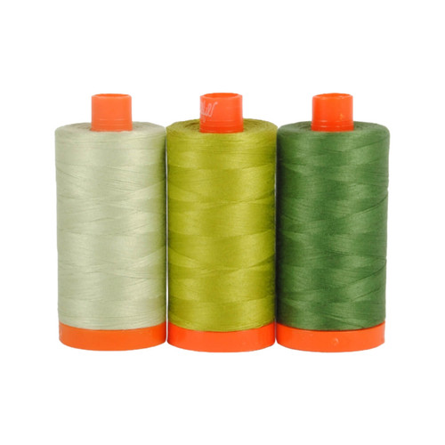 Three spools of Aurifil Dolomite 50wt Egyptian cotton thread in coordinating shades of green on a white background.
