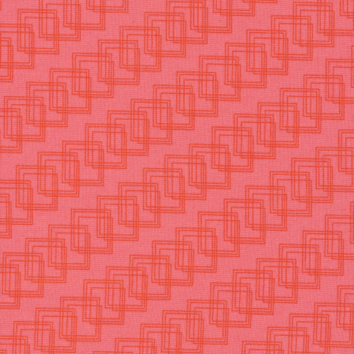 Close-up of Cloud9 Fabrics' Geo Cubes quilting fabric in orange, featuring geometric patterns.