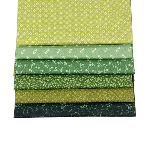 This image shows the 6 fat quarter fabrics from the Forest colourway in the Tonal Ditzy Collection.